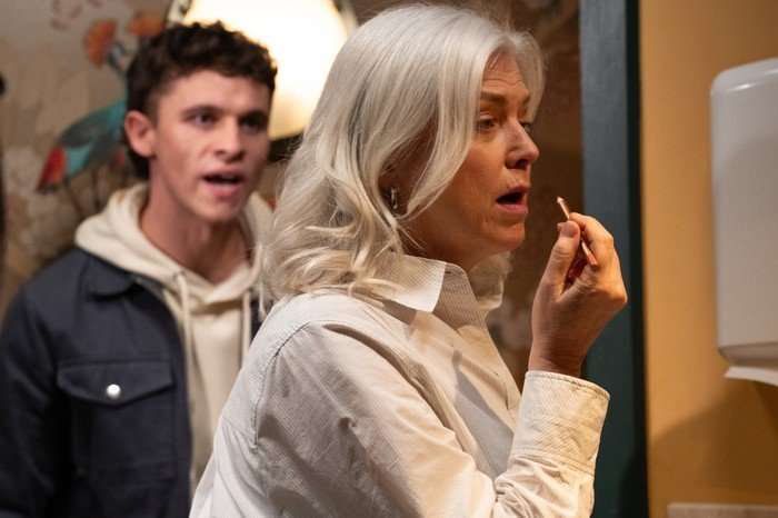 Jacob confronts Dr. Todd as she reapplies lipstick in Emmerdale