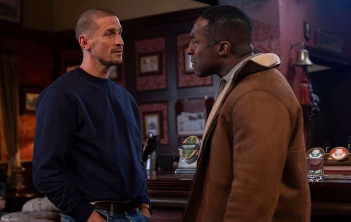 Carl has an altercation with Ronnie in the Rovers in a scene from Coronation Street