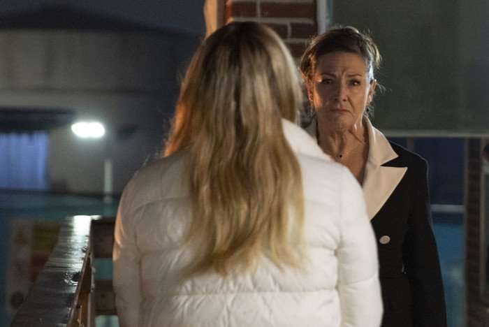 Maggie and Megan stand on the precinct walkway in Coronation Street