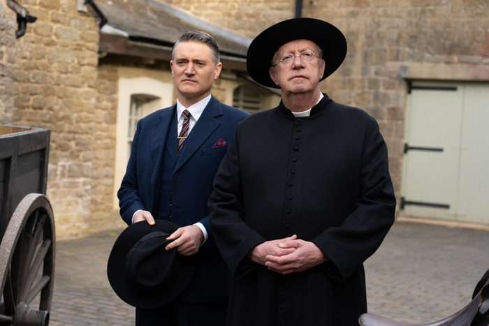 Tom Chambers as Chief Inspector Sullivan and Mark Williams as Father Brown in Father Brown