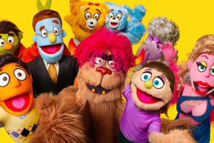 A selfie of the original Broadway puppets from Avenue Q