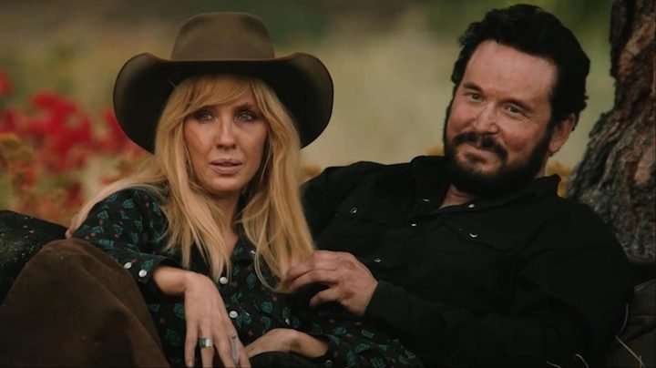 Beth Dutton and Rip Wheeler lay down next to each other in Yellowstone.