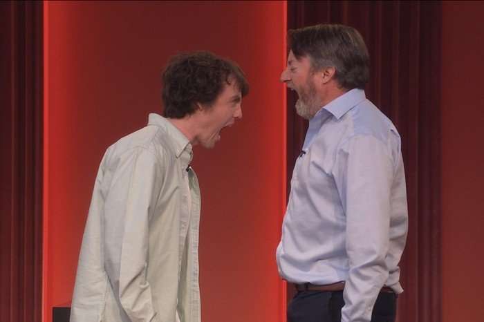 Sam Campbell and David Mitchell stood opposite one another screaming in each other's faces.