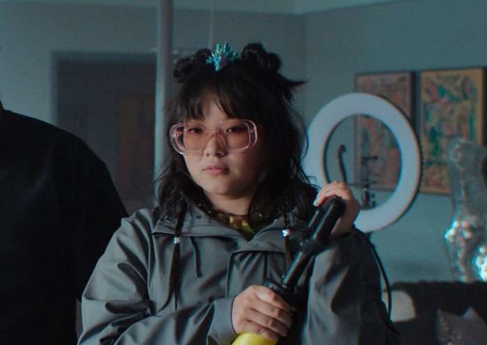 Nick Offerman and Thaddea Graham Thaddea Graham stands looking at someone off camera