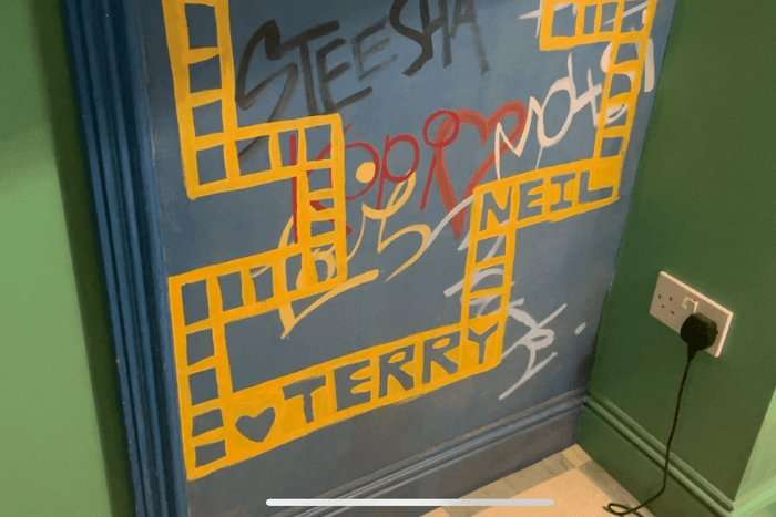 Neil Gaiman and Terry Pratchett's names on the Good Omens set