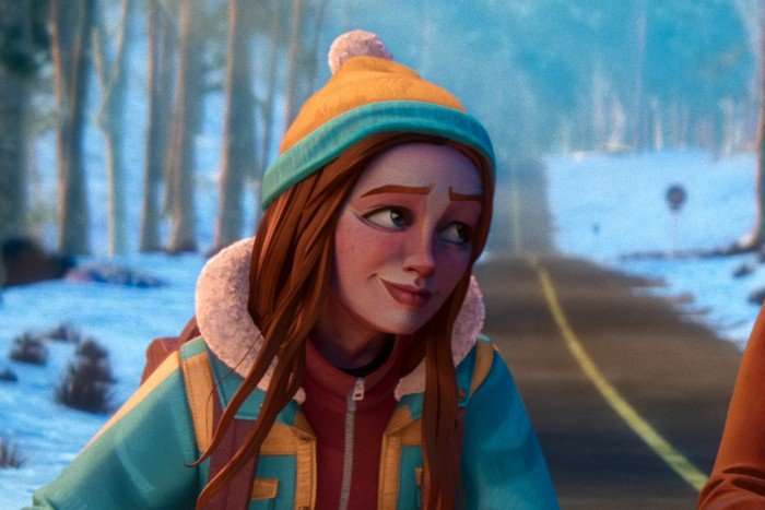 Jolie Hoang-Rappaport as Max Mayfield in Stranger Things: Tales From '85, riding a bike along a snowy road and looking to the side.