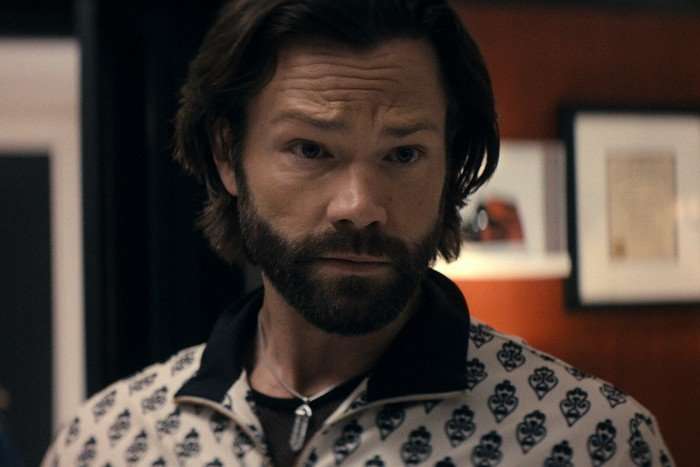 Jared Padalecki as Mister Marathon in The Boys, wearing a black and white jacket.