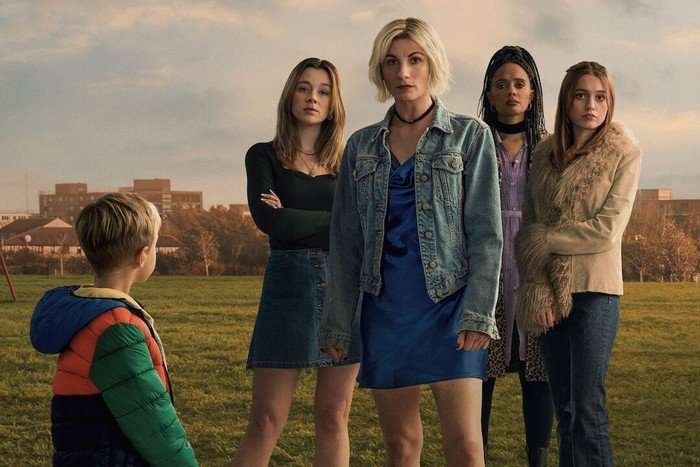 Jodie Whittaker, Aimee Lou Wood and Claudia Jessie in Toxic Town. There is another woman stood with them and a boy stood in front of them