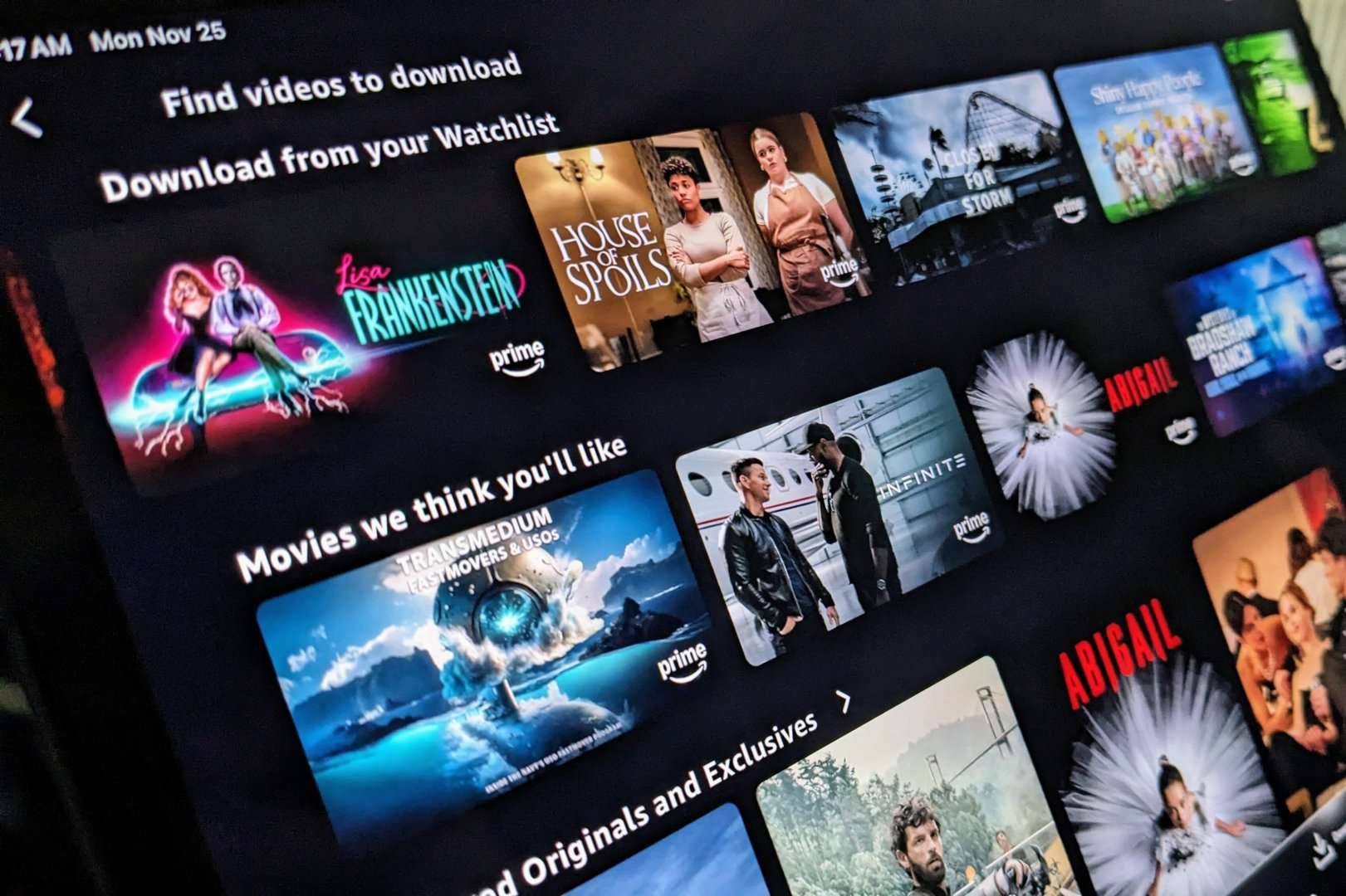 The Amazon Prime Video download page is displayed. It has tiles for a variety of movies and shows that are available for download within the app.