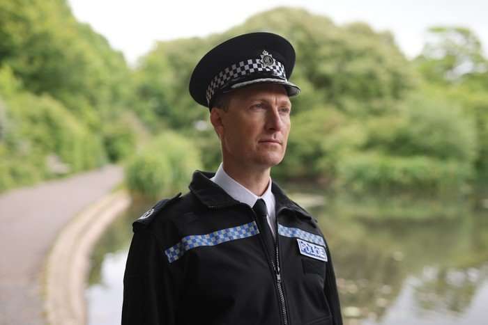 Sam Hoare as ACC Cassian Pewe in Grace in police uniform