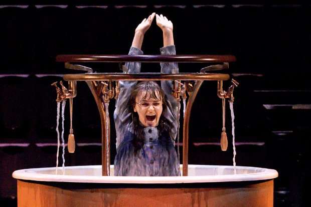 harry potter and the cursed child still with a woman holding her hands aloft