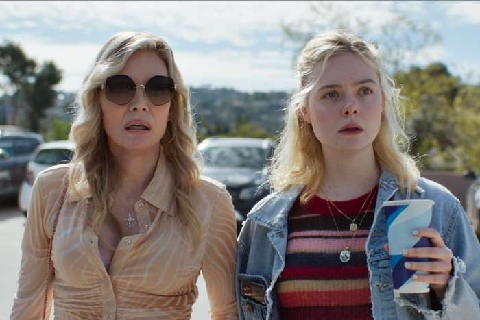 margo-elle-fanning-michelle-pfeiffer Michelle Pfeiffer and Elle Fanning star in Margo's Got Money Troubles; they are stood in a car park, looking stunned by something in the distance