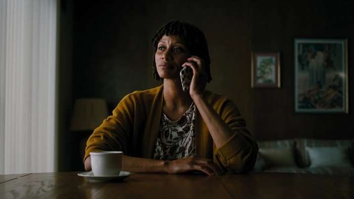 Nika King as Leslie Bennett sat on the phone in Euphoria season 3.