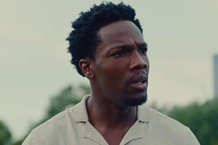 Michael (Tosin Cole) looks confused in a scene from Supacell