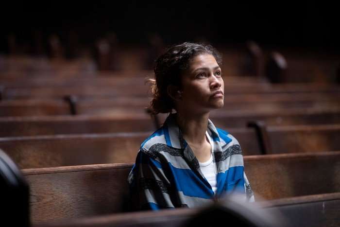 Zendaya as Rue Bennett in Euphoria season 3, sat among wooden chairs