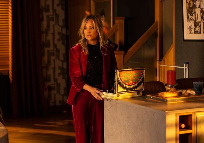 Sarah stood alone in the Platt residence in Coronation Street