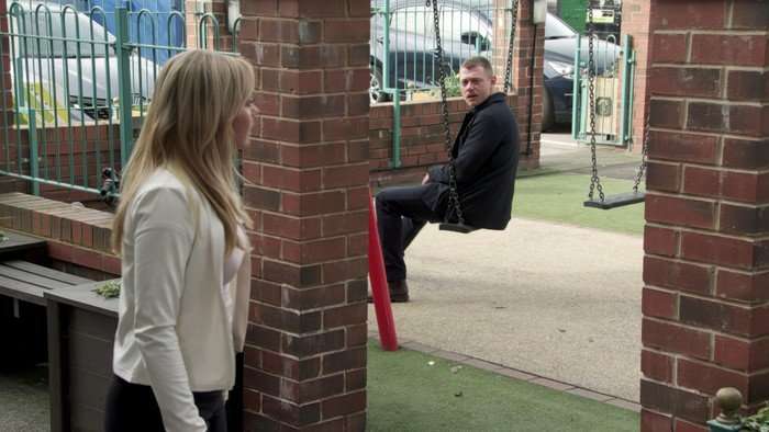 01_06_coro_megan_daniel_01 Megan approaches Daniel, who is sat on some swings, in Coronation Street