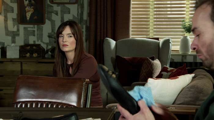 02_06_coro_jodie_david_02 Jodie glares towards David in Coronation Street.