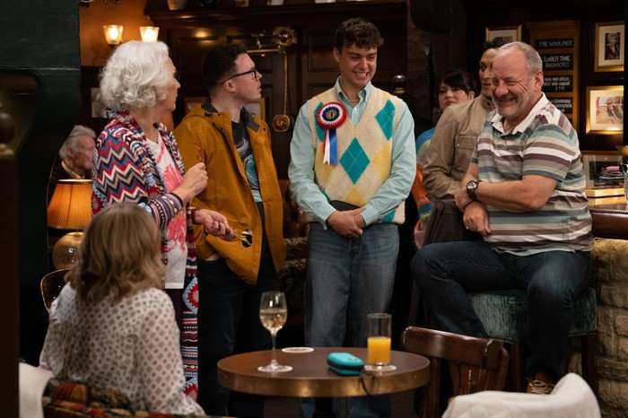 Lewis, Vinny, Jimmy and Mandy stand in The Woolpack in Emmerdale