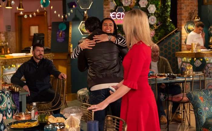 Leanne watches Alya hugging Idris in Coronation Street