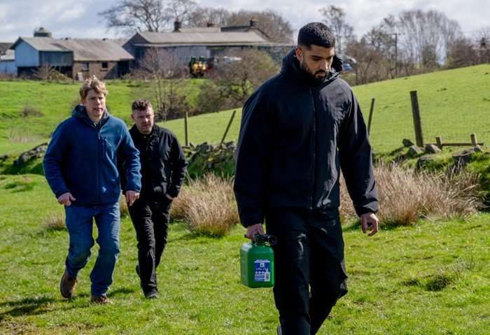 Robert and Aaron approach Kammy on the farm in Emmerdale