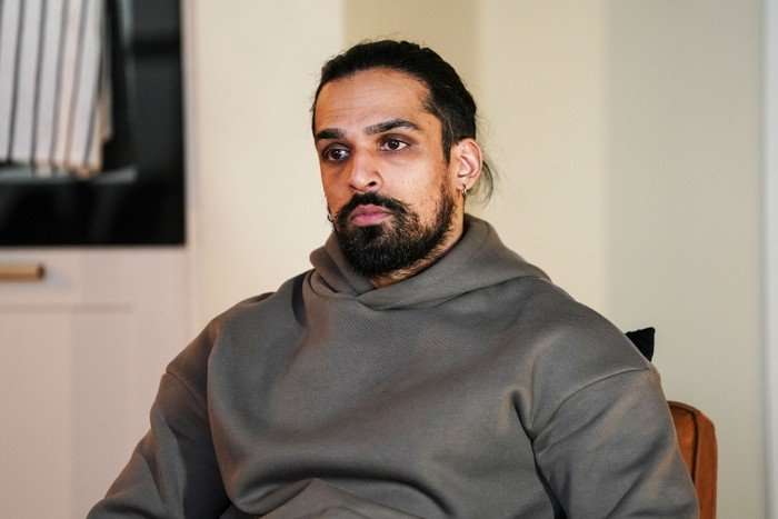Ravi looks glum in a scene from EastEnders