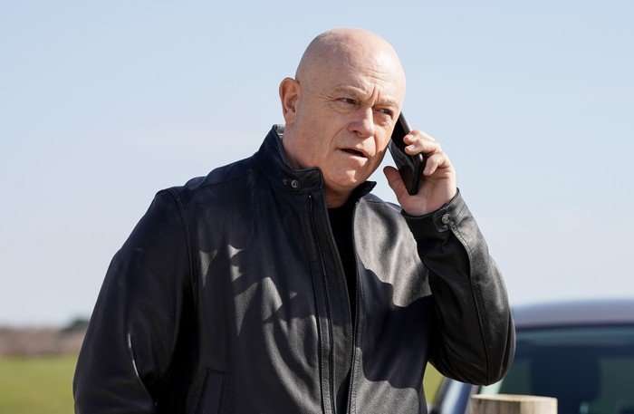 Grant Mitchell on the phone in a scene from EastEnders