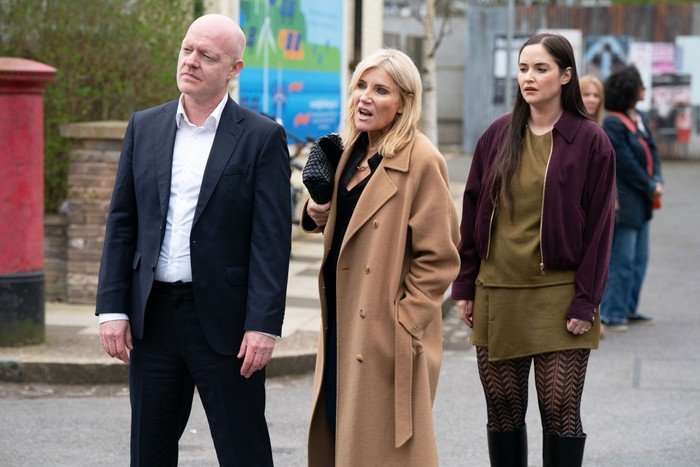 Max, Lauren and Cindy stare in the direction of the Mitchell house in EastEnders