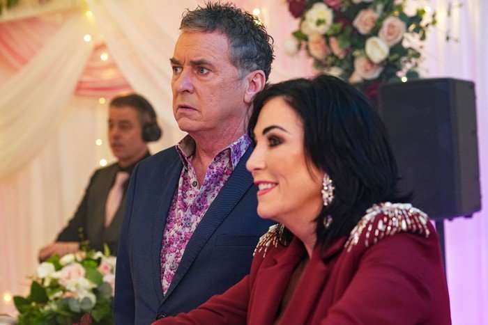 563267,TITLE:Eastenders Kat and Alfie look worried in EastEnders
