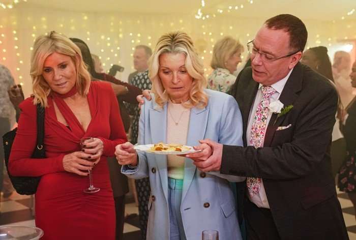 563272,TITLE:Eastenders Ian whisks Kathy away from Cindy in a scene from EastEnders