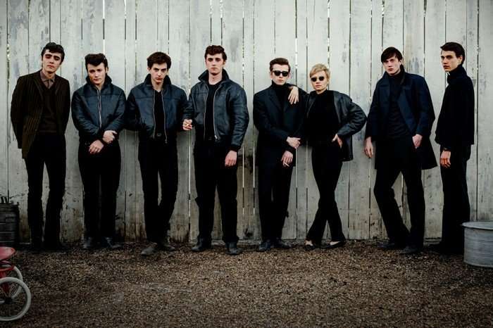 Ellis Murphy as Paul McCartney, Paddy Gilmore as Pete Best, Harvey Brett as George Harrison, Rhys Mannion as John Lennon, Louis Landau as Stuart Sutcliffe, Luna Jordan as Astrid Kirchherr, Casper von B&uuml;low as Klaus Voormann and Lasse Klene as J&uuml;rgen Vollmer in Hamburg Days, wearing leather jackets and stood against a fence. McCartney is in a suit.
