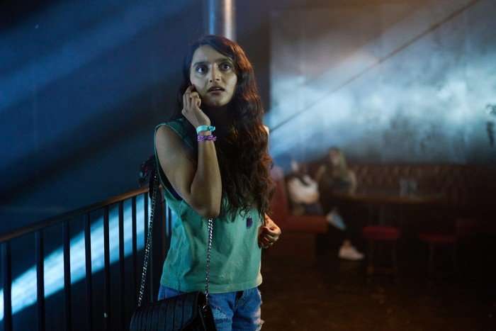 Aasiya Shah as Laila in Believe Me, speaking on the phone.