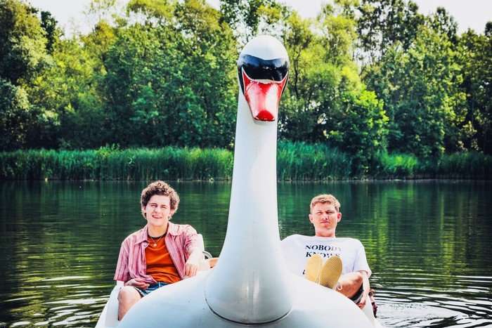 Dylan Llewellyn as Jack and Jon Pointing as Danny sat on a swan pedalo