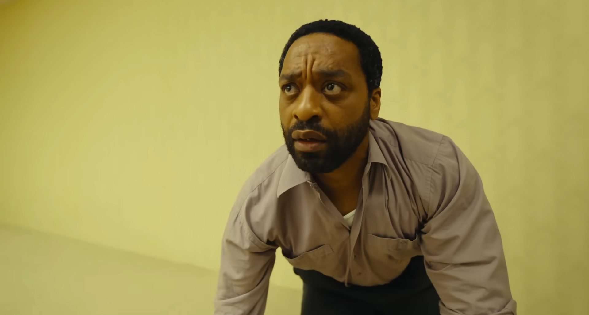 Chiwetel Ejiofor looking astonished in Backrooms, the horror film directed by Kane Parsons and produced by A24.