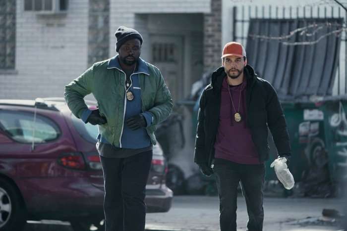Dope_Thief_Photo_010101 Brian Tyree Henry and Wagner Moura in Dope Thief, wearing police badges and walking together
