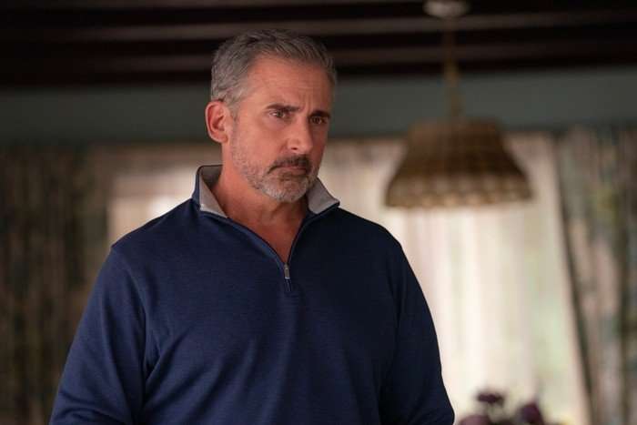 THE FOUR SEASONS Steve Carell as Nick in The Four Seasons, standing indoors looking troubled