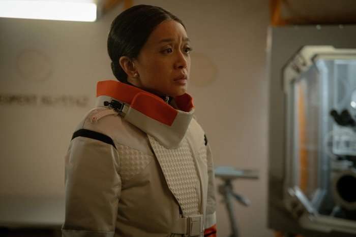 Cynthy Wu as Kelly Baldwin in For All Mankind season 5 Cynthy Wu as Kelly Baldwin in For All Mankind season 5, wearing a space suit and looking seriously ahead