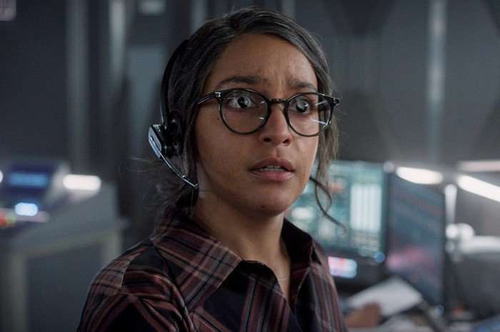 Coral Peña as Aleida in For All Mankind season 5 Coral Peña as Aleida in For All Mankind season 5, wearing a headset and looking shocked at something