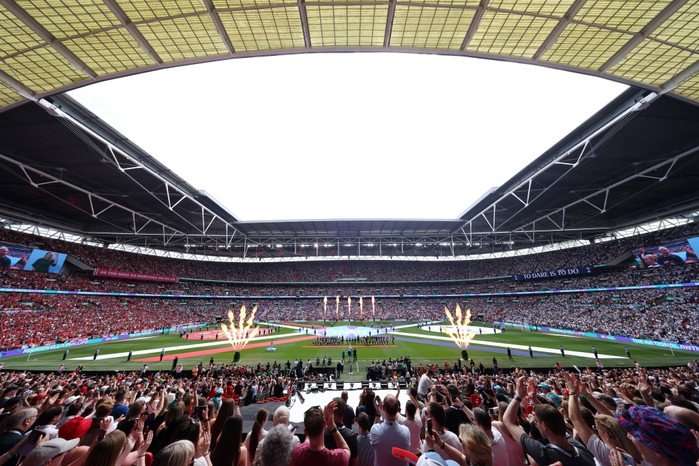 LONDON, ENGLAND - MAY 12: A general view of the inside of the stadium as players of Manchester United and Tottenham Hotspur line up with mascots, as a pyrotechnics displays takes place, prior to the Adobe Women's FA Cup Final match between Manchester United and Tottenham Hotspur at Wembley Stadium on May 12, 2024 in London, England. (Photo by Matt Lewis - The FA/The FA via Getty Images)