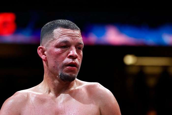 Boxer and MMA fighter Nate Diaz sweats in the ring during a fight.