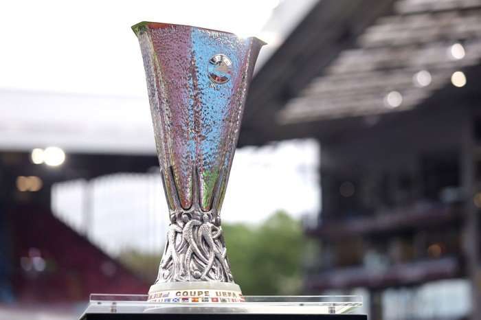 Europa League 2026 The Europa League trophy reflects light on a plinth at Villa Park.