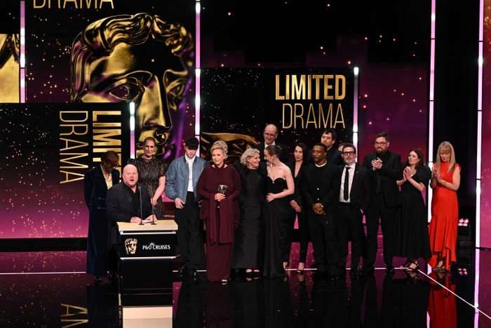 A guest, Emily Feller, Owen Cooper, Hannah Walters, Jack Thorne, Christine Tremarco, Erin Doherty, Mark Herbert, Ashley Walters, Niall Shamma and Peter Balm accept the Limited Drama Award onstage for 'Adolescence' during the 2026 BAFTA Television Awards with P&O Cruises at The Royal Festival Hall on May 10, 2026 in London, England.