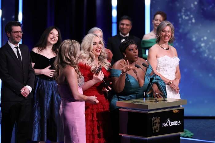 Harriet Kemsley, Roisin Conaty and Judi Love accept the Entertainment Award for 'Last One Laughing' onstage during the 2026 BAFTA Television Awards with P&O Cruises at The Royal Festival Hall on May 10, 2026 in London, England.