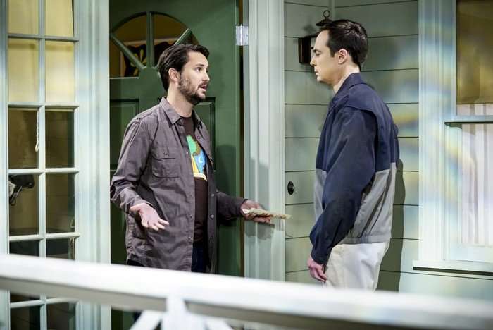 The Big Bang Theory Wil Wheaton as himself and Jim Parsons as Sheldon Cooper in The Big Bang Theory. Wheaton is stood in a doorway and Sheldon is stood opposite him.