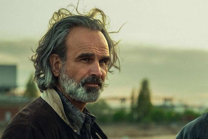 Gerald Kyd as Mylonas in Legends, stood outside.