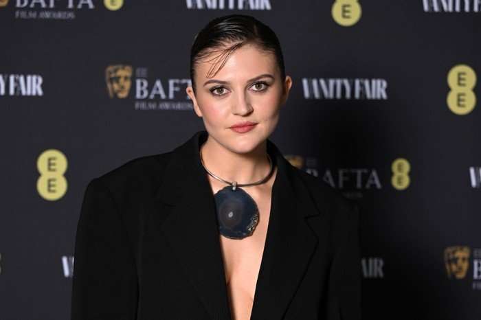 Lara Peake in a black blazer