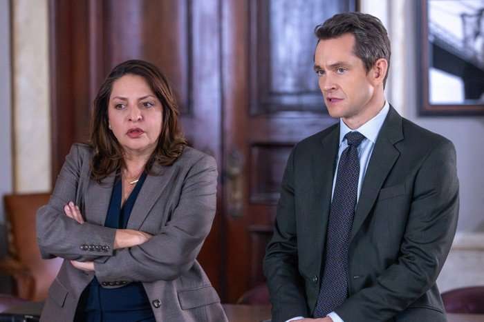 Two people in suits.