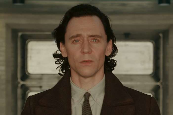 Tom Hiddleston in Loki season 2 wearing a suit, looking sad