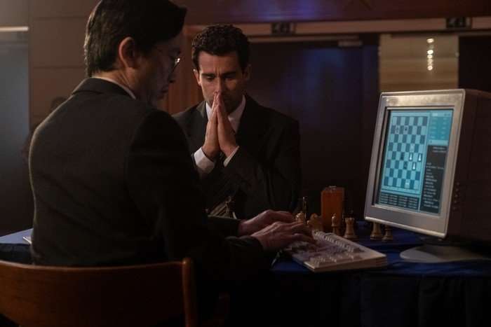 Christian Cooke plays Garry Kasparov in Rematch, looking anxious during a chess game