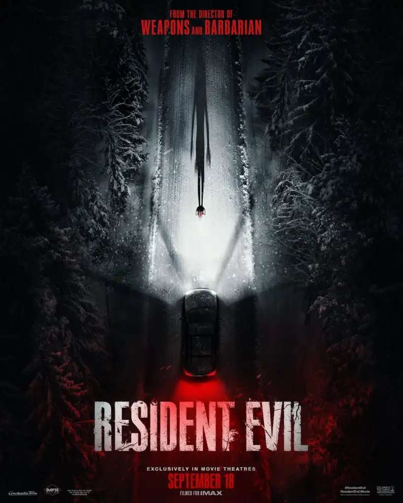 A truck stops in front of a character on the Resident Evil poster.